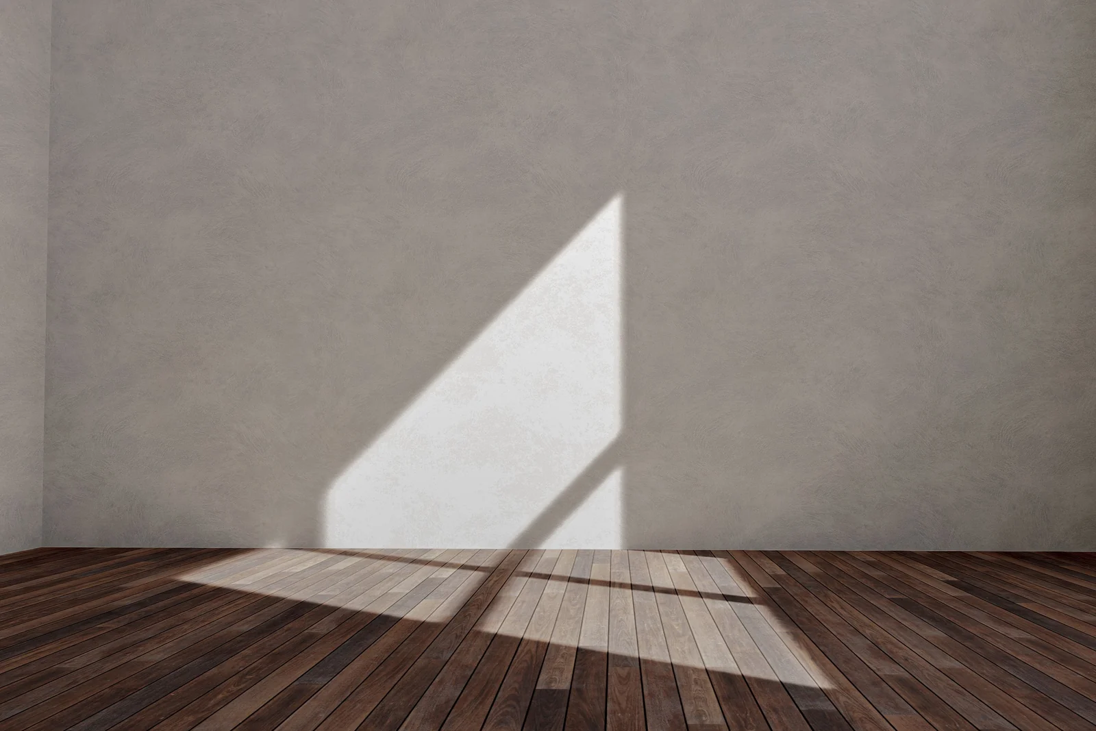 An empty sunlit room with bare walls and a wooden floor, where the shadow of a window frame falls across the boards.
